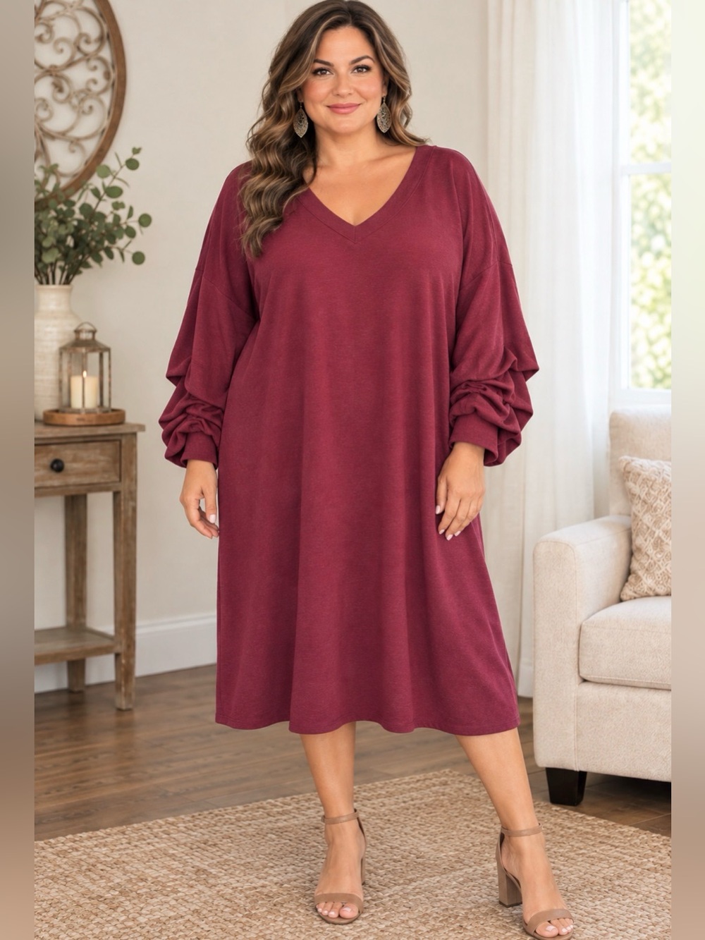 Eloquii Rich burgundy V-neck maxi dress with long volume/balloon sleeves.